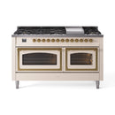 Antique white dual fuel range with brass knobs and two oven windows
