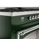 Emerald green dual fuel range control panel with chrome knobs and digital display