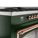 Range control panel with digital display and copper rotary knobs, emerald green