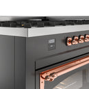 ILVE dual fuel range control panel with copper knobs and digital display