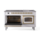 White dual fuel range with brass trim, right and left oven doors open