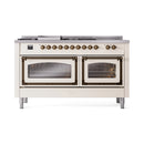 Antique white dual oven range with two glass doors and brass control knobs