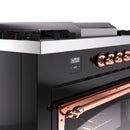 Dual fuel range control panel with copper knobs and digital display