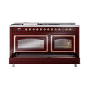 Burgundy dual oven range with copper-trimmed door frames and glass windows