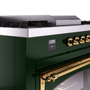 Emerald green range control panel with gold knobs and digital display