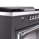 Matte graphite range front with chrome control knobs and digital display