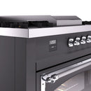 Dual fuel range control panel with digital display and chrome control knobs