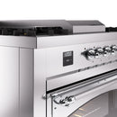 Stainless steel control panel with clock display and chrome burner knobs on gas range