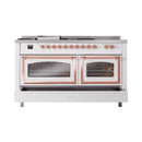 White dual oven range with triple glass doors and copper-trimmed controls