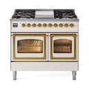 Antique white dual fuel gas range with lit burners, two oven windows, brass-trimmed doors