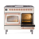 Antique white dual fuel range with left oven door open, right oven door closed, copper trim