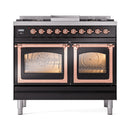 Glossy black dual-fuel range front with two oven windows and copper-trimmed burner controls