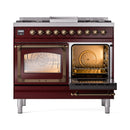 Burgundy range with two open ovens showing racks inside, bronze trim and handles
