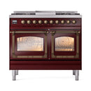 Burgundy dual fuel range front with twin glass oven doors and bronze control knobs