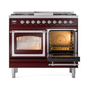 Burgundy dual fuel range with right oven open, left glass door closed, and chrome control knobs