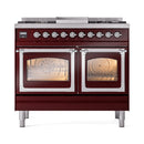 Burgundy dual fuel range with chrome knobs, cooktop burners, and both oven doors open