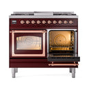 Burgundy range with left oven door open, copper trim, and right glass door closed