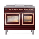 Burgundy dual fuel range with copper trim, two oven doors, and 4-burner cooktop