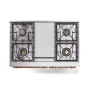 Gas cooktop with four burner grates and copper-trim front rail