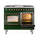 Emerald green dual fuel gas range with both oven doors open, lit interiors and racks