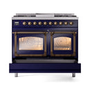 Midnight blue dual fuel range with bronze knobs and two oven doors with glass windows