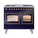 Midnight blue dual fuel range with bronze knobs and two oven doors with glass windows