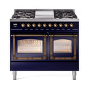 Midnight blue dual fuel range with bronze control knobs and double glass oven doors