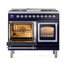 Midnight blue dual fuel range with one oven door open, two racks inside