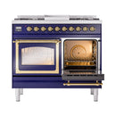 Midnight blue dual fuel range with left oven door open; wire rack inside, brass trim