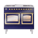 Midnight blue dual fuel range showing both glass oven doors closed with brass trim