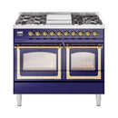 Midnight blue gas range with brass knobs, dual oven doors, and triple glass windows