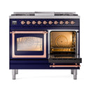 Midnight blue dual-fuel range with both ovens open, copper handles and oven racks visible