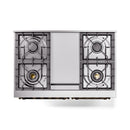 Underside view of dual fuel range showing burners and grates in matte graphite