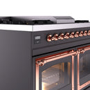 Matte graphite control panel with copper knobs and copper burner rail above an oven door