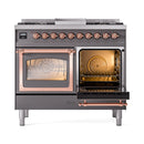 Dual fuel gas range with right oven open, illuminated interior, racks, and copper trim