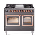 Matte graphite dual fuel range with copper-trimmed triple glass oven doors and gas burners