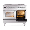 Stainless steel dual fuel gas range with two oven doors open and illuminated interiors