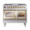 Stainless steel range with brass trim and two open oven doors, racks visible through windows