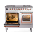 Stainless steel range with left oven door open showing interior racks and heating area