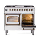 White dual-fuel range with left oven open and right oven open, bronze accents