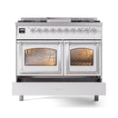 White dual-fuel gas range with chrome trim, two closed oven doors, and burner top