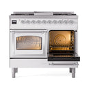 White dual-fuel gas range with left oven closed and right oven open, chrome racks