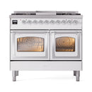 White dual-fuel gas range with chrome trim and two closed triple-glass oven doors