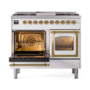 White dual fuel range with left oven open and right triple-glass oven door closed.