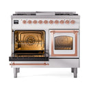 White ILVE dual fuel range with one oven open and copper-trimmed second oven door.