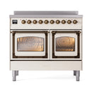 Antique white induction range with bronze-trim double oven doors, viewing cooking racks