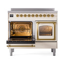 Induction range with open ovens showing illuminated interiors, racks, and brass hardware