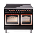 Glossy black induction range with triple glass doors, copper trim, and front control knobs