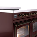 Bronze knob control and oven handle on burgundy induction range