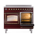 Burgundy induction range with left oven door open and right glass door closed